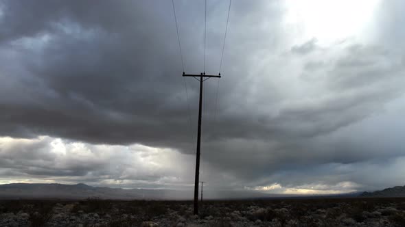 Time Lapse Of Telephone Pole The Mojave Desert Storm Clouds - 4k alt