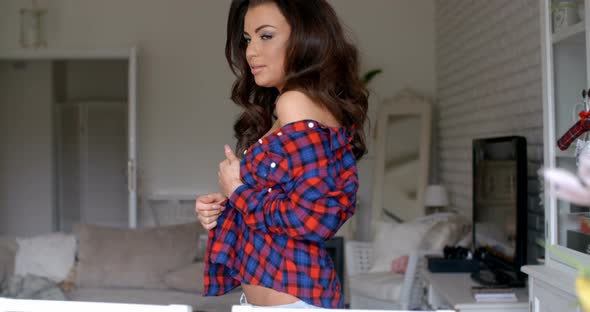 Sexy Woman In Checkered Shirt Looking At Camera