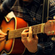Man Playing an Acoustic Guitar on a Beautiful Back - VideoHive Item for Sale