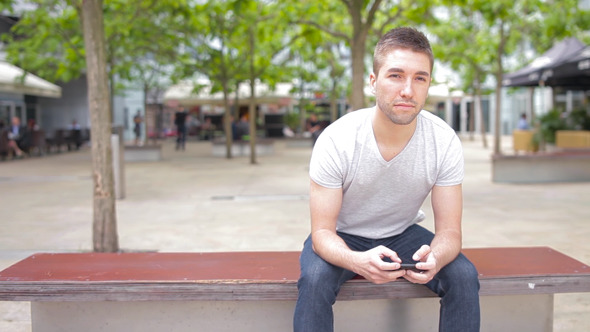 Student Playing with Electronic Device alt