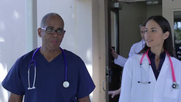 Medical Team Having Discussion Outdoors 4 alt