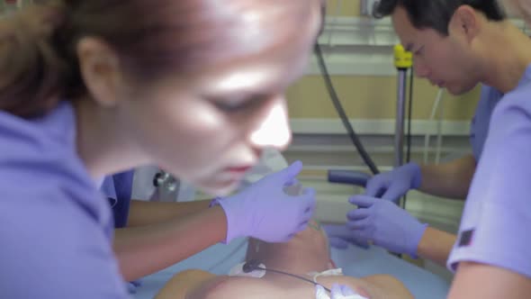 Medical Team Working On Patient In Emergency Room 1