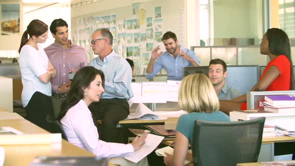 Interior Of Busy Design Agency With Staff Working 3