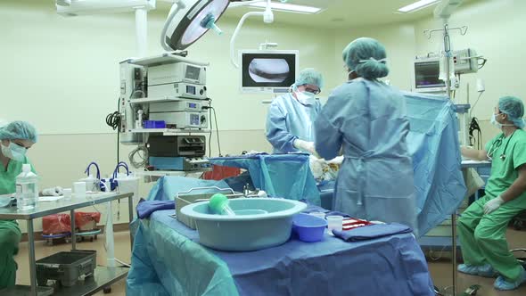 Surgical Team Working In Operating Theatre 2