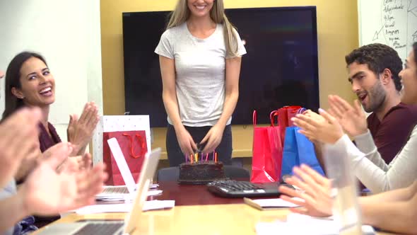 Workers Celebrating Colleague's Birthday In Office 1 alt