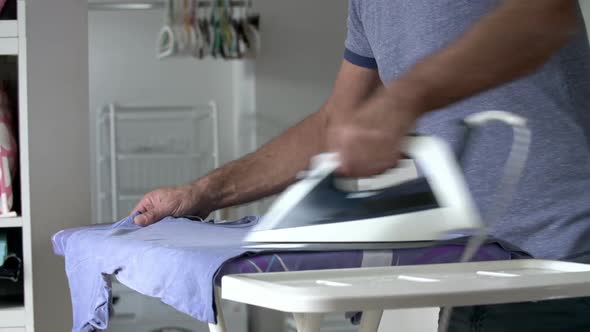 Man Ironing Laundry 3