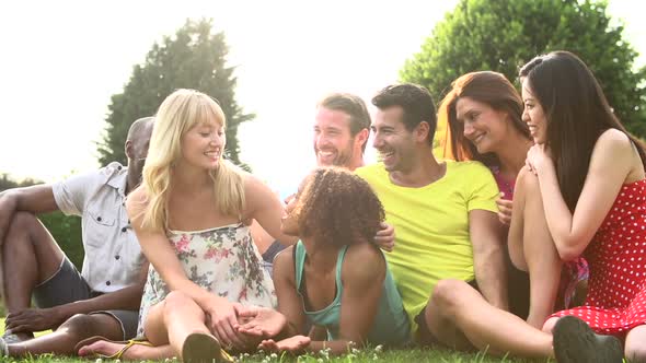 Friends Sitting On Grass Together 4