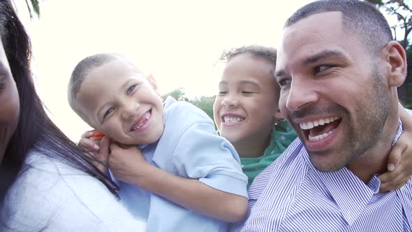 Parents Giving Children Piggybacks 1