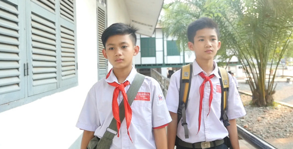 Two Asian Boys Walking To School