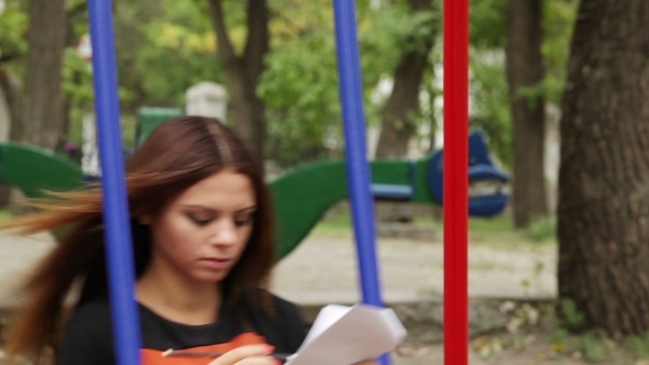 Beautiful Girl In The Autumn Park