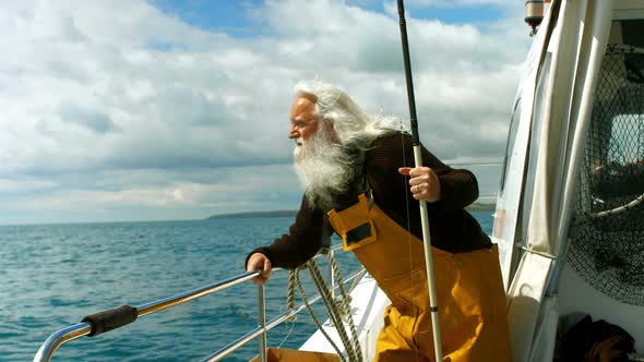 Fisherman holding fishing rod