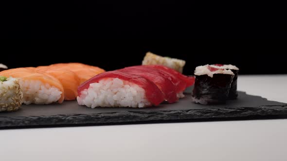 Sushi assortment rotating on a plate