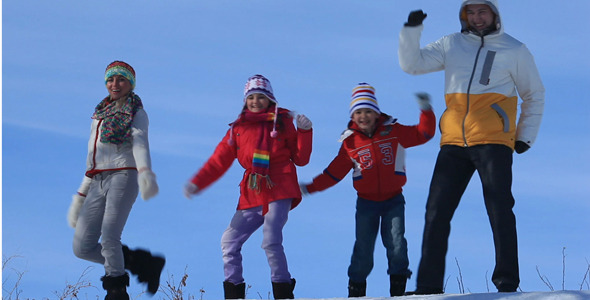 Family Dancing On Snow