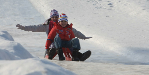 Family Riding on Sledges