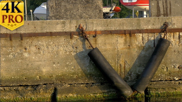 Stone Wall of the Pontoon Harbour with Yachts