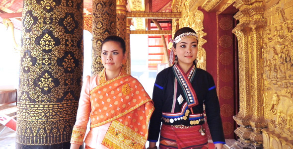 Two Girl Walking In Temple