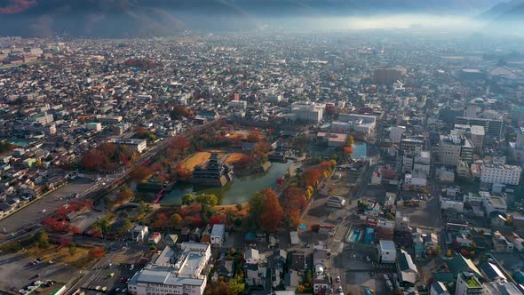 Aerial View 4k footage of Matsumoto Castle on morning in Matsumoto city