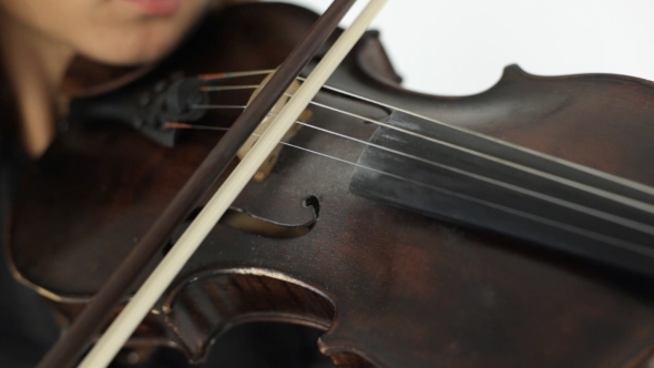 Girl Playing The Violin With Inspiration