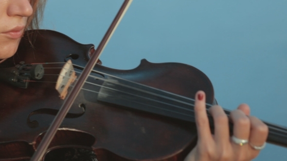 Girl Emotionally Plays The Violin