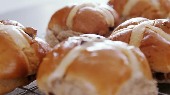 Hot cross bun on baking tray