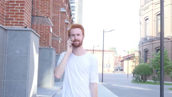 Walking Man Talking on Phone w/ Loft Building Background, Front View