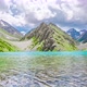 Clouds over a turquoise mountain lake - VideoHive Item for Sale