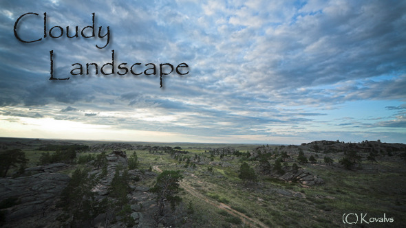 Wild Landscape With Rock And Clouds alt