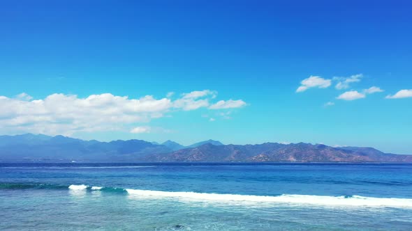 Aerial top down landscape of beautiful coast beach holiday by transparent water and white sandy back