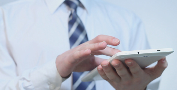 Businessman Using Touchpad in the Office alt