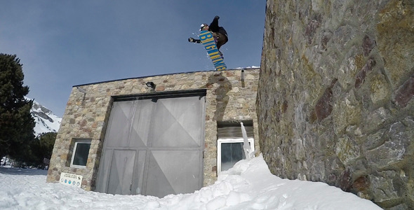 Snowboard Jumping A Roof