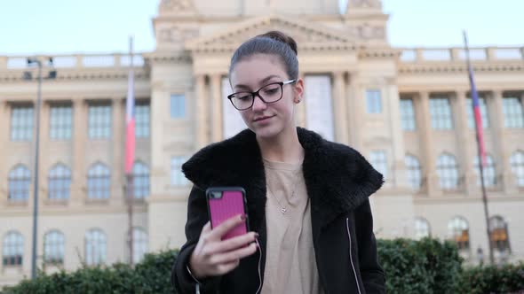 Prague Czech Republic, Teenage Girl Taking Selfie Photo With Smartphone in Front of National Museum