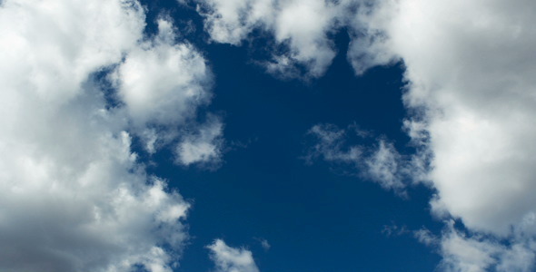 Clouds Float On a Blue Sky