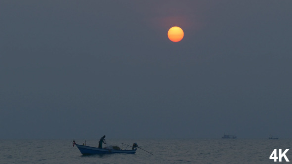 Fisherman On Sea In The Morning