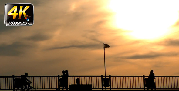People Silhouette on Bridge and Sunset 2