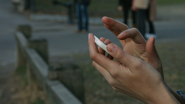 Girl Using Smartphone in Central Park 2