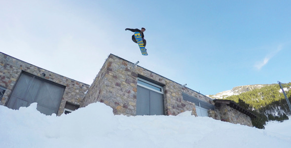 Snowboard Jumping A Garage Roof