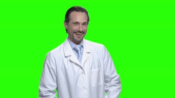 Cheerful Laughing Male Doctor in White Coat