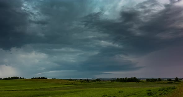 Timelapse Video of an Intense Rotating Supercell Thunderstorm with Impressive Lightning Strikes Dark