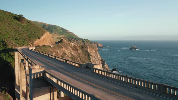 Scenic Aerial View of Famous Highway Bridge Running Along the Pacific Coastline