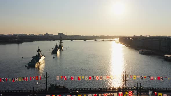 Aerial Morning Cityscape with Warships in the Waters of the Neva River Before the Holiday of the