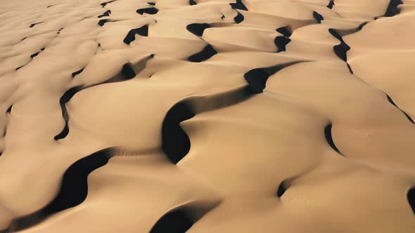  Aerial Video of a Climate Change Results. Dry Desert Earth. Waving Sand Dunes