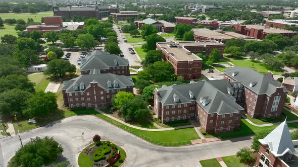 Aerial orbit of Baylor University college campus in Waco Texas USA.