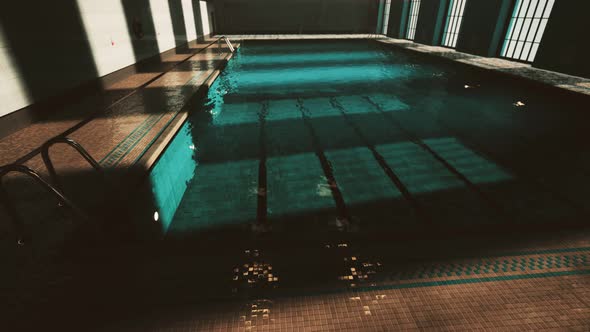 The View of an Empty Public Swimming Pool Indoors alt