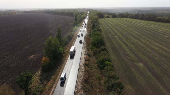 Traffic Motion Aerial Panorama View. Road Rollers Building the New Asphalt Road