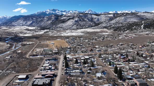 Flyover Scenic Cityscape Of Snowy Mountain Village Ridgway Colorado Usa
