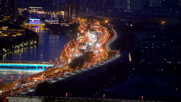 busy interchange traffic at night in city