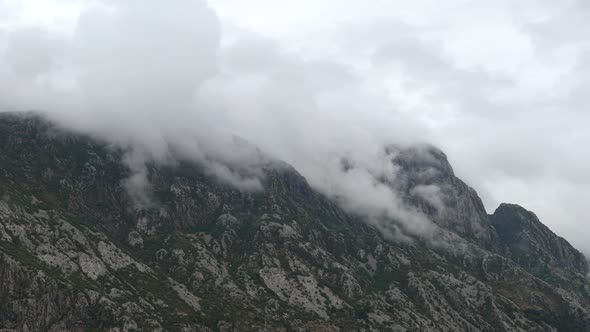 Moving dramatic storm clouds in mountains