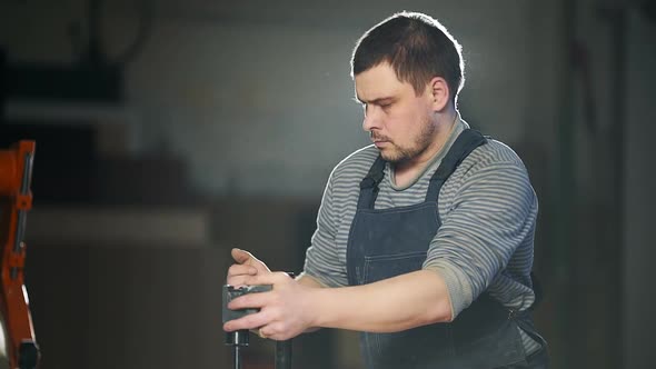 Carpenter Working in Studio