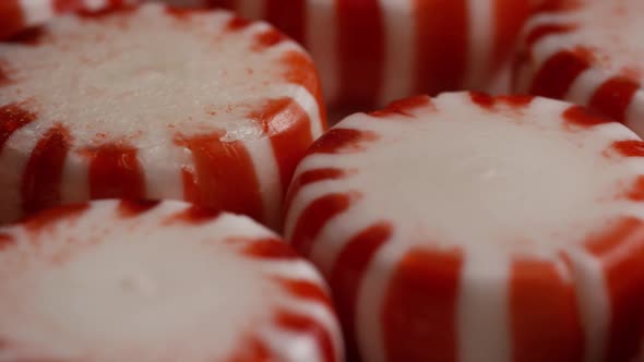 Rotating shot of peppermint candies - CANDY PEPPERMINT 039