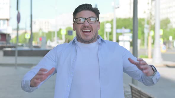 Portrait of Man Shouting and Screaming Outdoor